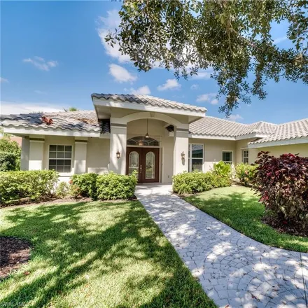 Buy this 4 bed house on 11991 Cypress Links Drive in Gateway, FL 33913