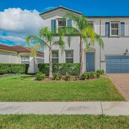 Buy this 4 bed house on 7994 Southwest Greenbank Circle in Port Saint Lucie, FL 34987