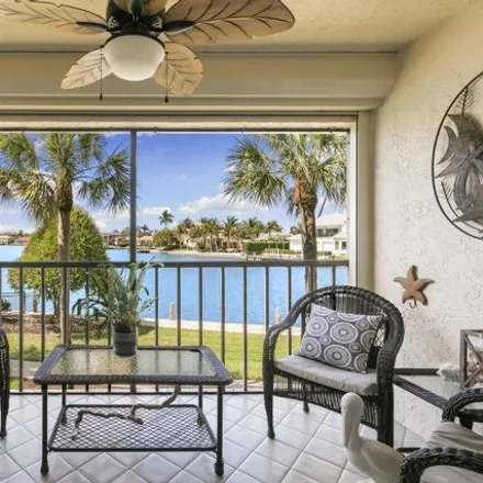 Buy this 2 bed condo on 852 West Elkcam Circle in Marco Island, FL 34145