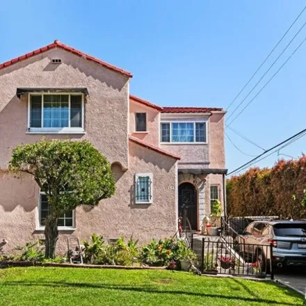 Buy this 4 bed house on 4819 San Vicente Boulevard in Los Angeles, CA 90019