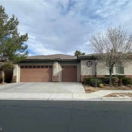 Rent this 3 bed house on 10402 Garden Light Drive in Summerlin South, NV 89135