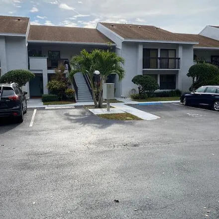 Rent this 2 bed apartment on 5021 Golfview Court in Palm Beach County, FL 33484