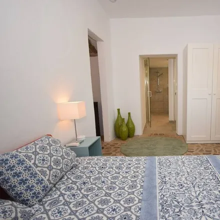 Rent this 1 bed townhouse on Rua de Portugal in 8100-082 Loulé, Portugal