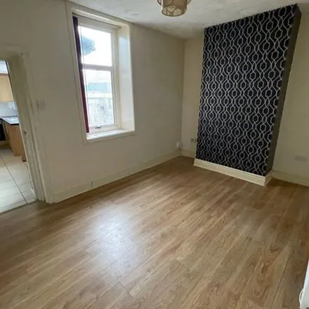 Rent this 3 bed townhouse on Clayton Le Moors Post Office in 38 Pickup Street, Accrington
