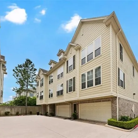 Buy this 2 bed townhouse on 3081 Murworth Drive in Houston, TX 77025