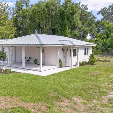 Buy this 3 bed house on 131 Interlake Ave in Deland, Florida