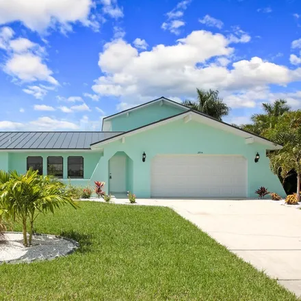 Rent this 4 bed house on 2214 Coral Point Drive in Cape Coral, FL 33990