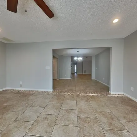 Rent this 3 bed apartment on 8945 Village Hills Drive in Harris County, TX 77379