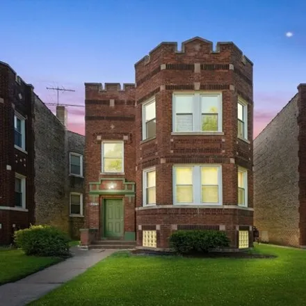 Buy this 4 bed house on 7734 South Merrill Avenue in Chicago, IL 60649