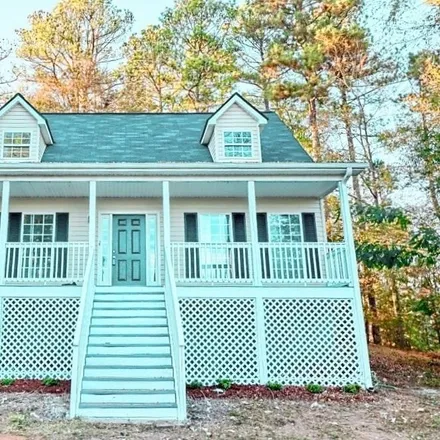 Buy this 3 bed house on 2627 White Road Northeast in Rockdale County, GA 30012