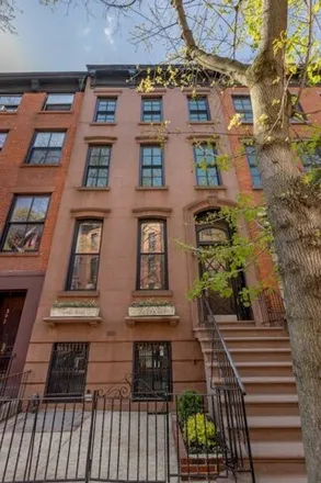 Buy this 7 bed townhouse on 300 Hicks Street in New York, NY 11201