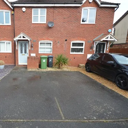 Rent this 2 bed townhouse on 2 Enville Close in Marston Green, B37 7GQ