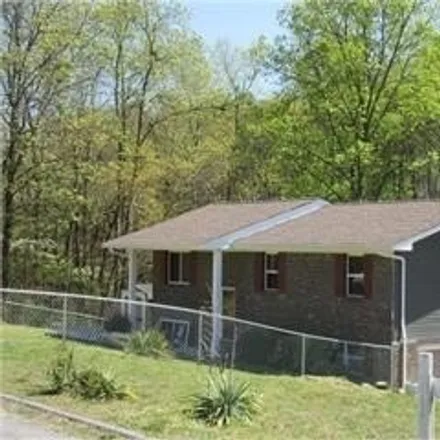 Buy this 3 bed house on 56 Marion Dr in Ringgold, Georgia