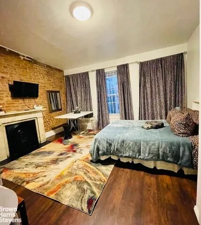 Rent this studio townhouse on 323 East 116th Street in New York, NY 10035