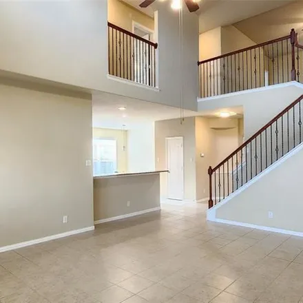 Rent this 4 bed apartment on 27072 Barrow Glen Drive in Fort Bend County, TX 77494