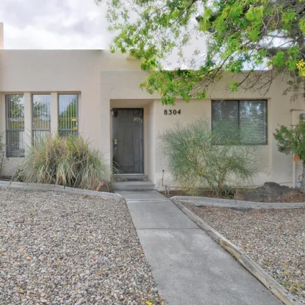 Buy this 3 bed townhouse on 8304 Della Road Northeast in Albuquerque, NM 87109