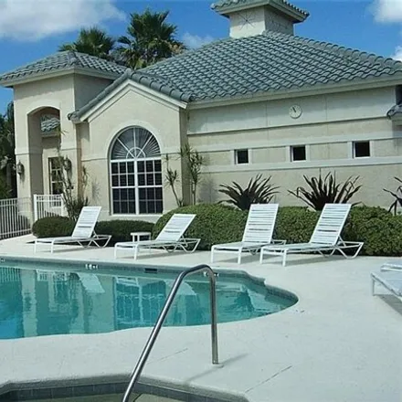 Rent this 3 bed condo on 673 Vintage Reserve Cir Unit 11c in Naples, Florida