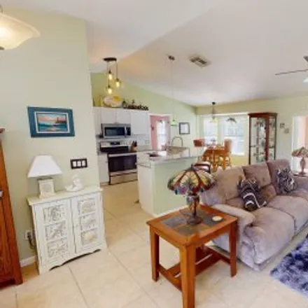 Buy this 3 bed apartment on 2629 Southwest 9Th Place in Pelican, Cape Coral