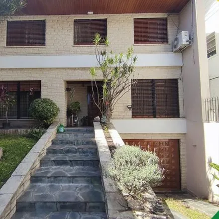 Buy this 4 bed house on 108 - Castelli 3760 in Villa General Juan Gregorio de Las Heras, Villa Ballester