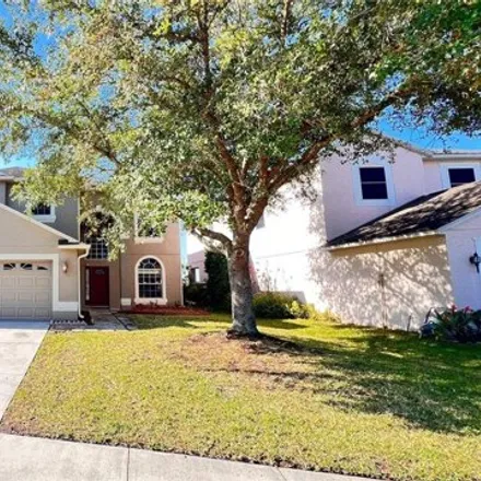 Rent this 4 bed house on 18088 Falcon Green Court in Orange County, FL 32820