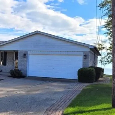 Buy this 3 bed house on 29379 S Seaway Ct in Harrison Township, Michigan