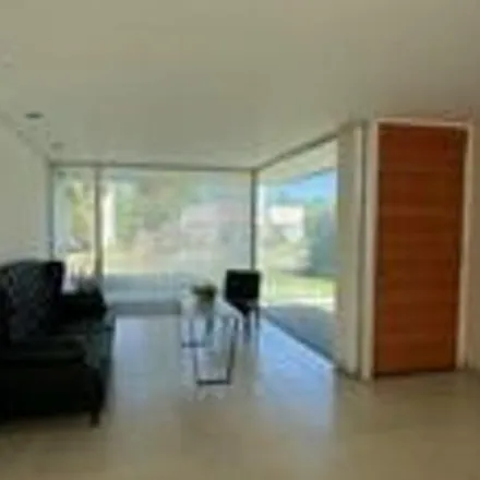 Buy this 3 bed house on unnamed road in Bosque de Peralta Ramos, B7603 DRT Mar del Plata