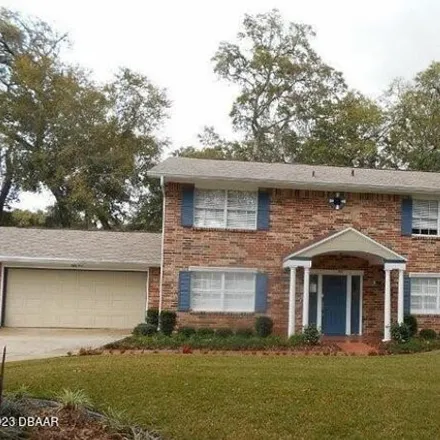 Rent this 4 bed house on 55 Raintree Lane in Ormond Beach, FL 32174