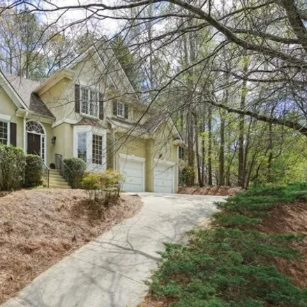 Buy this 4 bed house on 5680 Ashewoode Downs Drive in Johns Creek, GA 30005