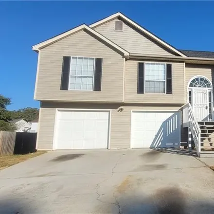 Rent this 4 bed house on 8117 Mountain Pass in Riverdale, GA 30274