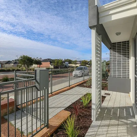Rent this 3 bed apartment on 53 Cilantro Parkway in Seville Grove WA 6112, Australia