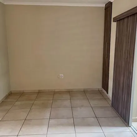 Rent this 1 bed apartment on Mapengo Street in Mofolo, Soweto