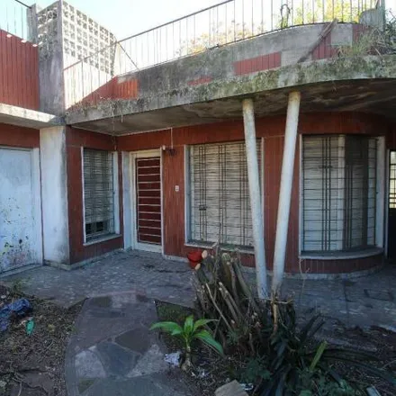 Buy this 3 bed house on Rivera Indarte 1782 in Partido de La Matanza, B1754 BYQ Villa Luzuriaga