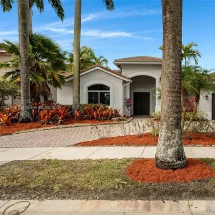 Rent this 4 bed house on 1666 Victoria Pointe Circle in Weston, FL 33327