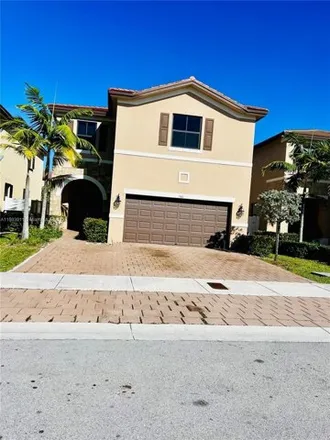 Rent this 4 bed house on 3501 West 104th Terrace in Hialeah, FL 33018