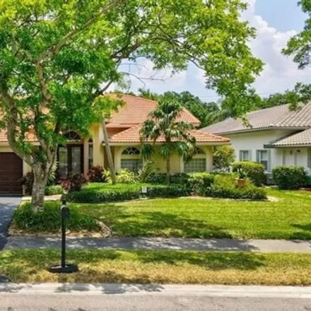 Buy this 5 bed house on 4857 Kensington Circle in Coral Springs, FL 33076