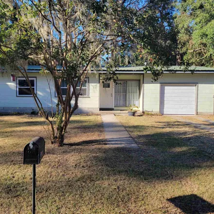 Buy this 4 bed house on 300 West Cedar Street in Perry, FL 32347