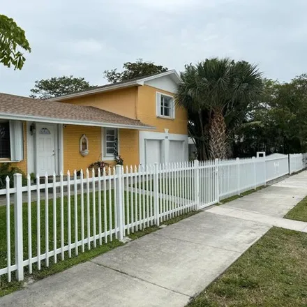 Buy this 4 bed house on 1149 18th Avenue North in Lake Worth Beach, FL 33460