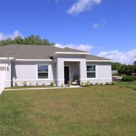 Buy this 4 bed house on 592 Sw Dauphin Cir in Port Saint Lucie, Florida