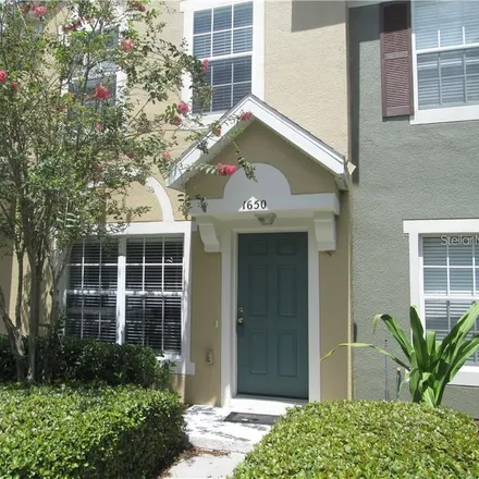 Rent this 2 bed townhouse on 1650 Stockton Drive in Sanford, FL 32771