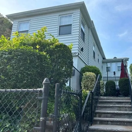 Buy this 4 bed house on 85-89 67th Ave in Rego Park, New York