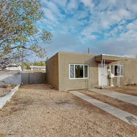 Buy this 4 bed house on 2518 Cardenas Drive Northeast in Albuquerque, NM 87110