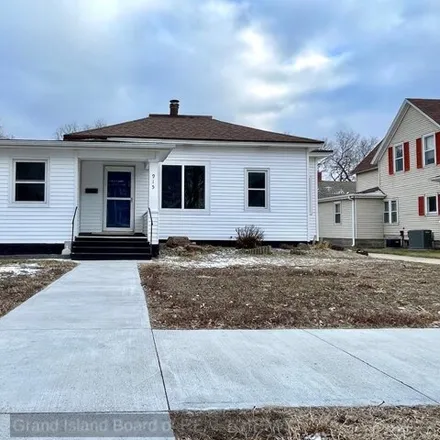 Buy this 2 bed house on Mid Nebraska Foot Clinic in 820 West Division Street, Grand Island