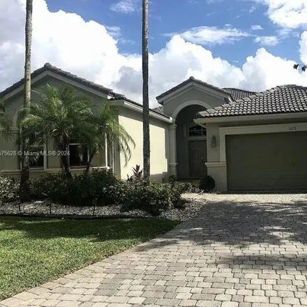 Rent this 4 bed house on 1123 Chenille Circle in Weston, FL 33327