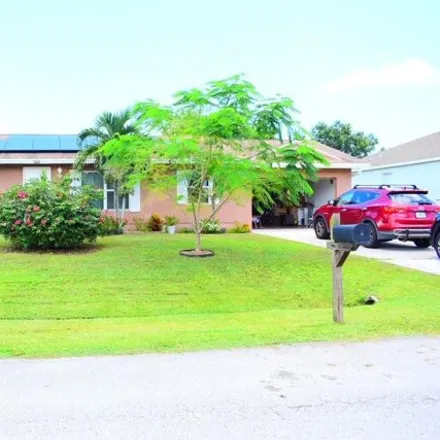 Buy this 3 bed house on 735 Northwest Tremont Avenue in Port Saint Lucie, FL 34983