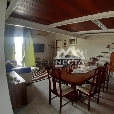 Buy this 3 bed apartment on Rua Sady Gomes de Almeida in Golfinhos, Caraguatatuba - SP