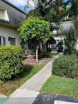 Buy this 3 bed townhouse on Northwest 4th Avenue in Boca Raton, FL 33432