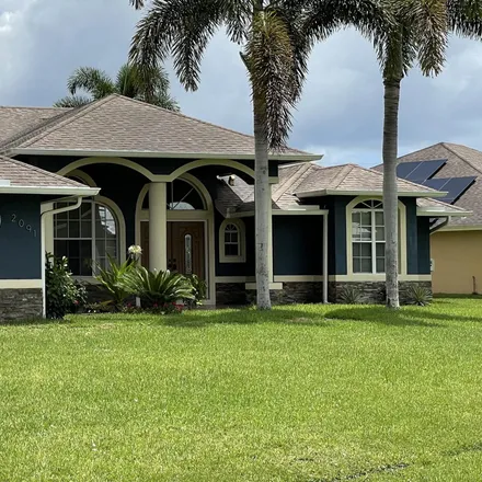Buy this 3 bed house on 2091 Southwest Grant Avenue in Port Saint Lucie, FL 34953
