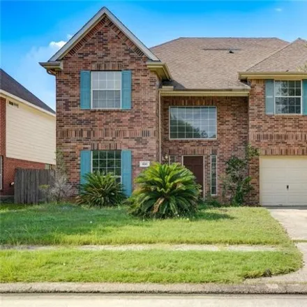 Rent this 4 bed house on 630 Manchester Trail Dr in Spring, Texas