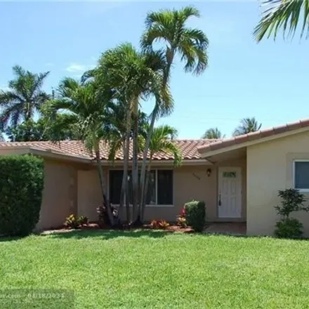 Rent this 3 bed house on 4468 Northeast 18th Avenue in Coral Hills, Broward County