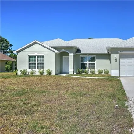 Rent this 3 bed house on 8675 104th Avenue in Vero Lake Estates, Indian River County